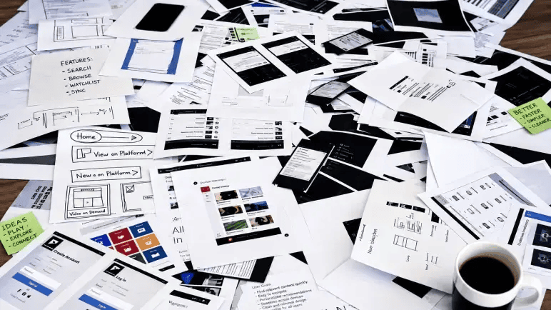 Figma pitch deck slide showing scattered paper wireframes and sketches illustrating the design problem